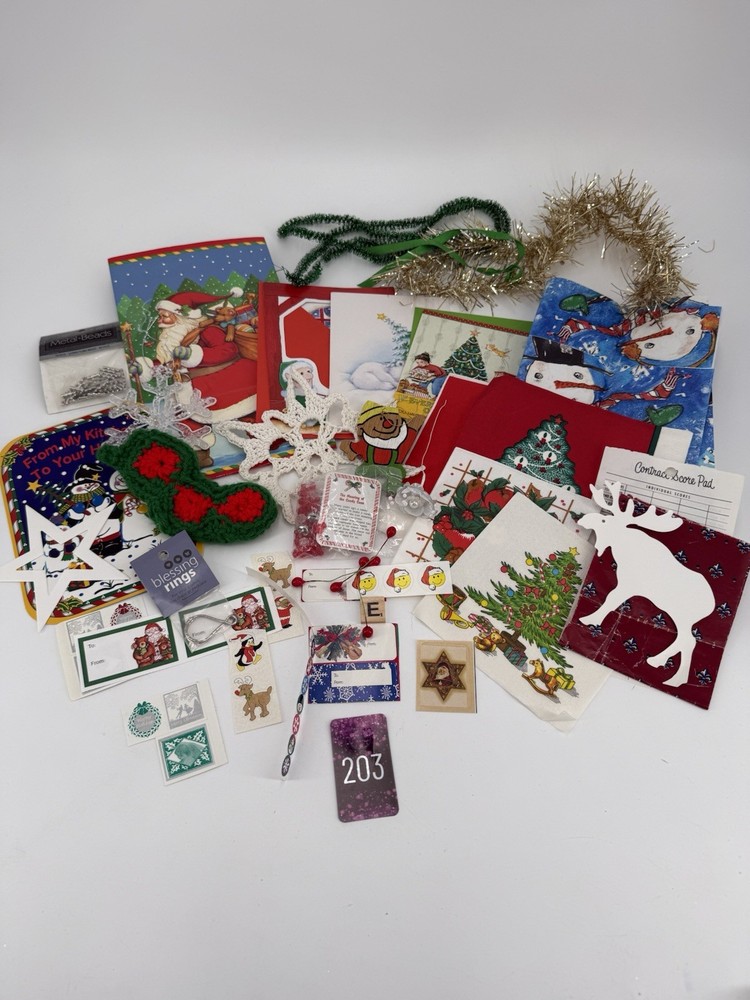 A collection of assorted Christmas-themed craft supplies and decorative items.