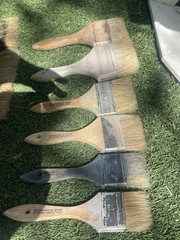 assorted paint brushes /two 4 Inch / Two 3 Inch / Two 2.5 Inch