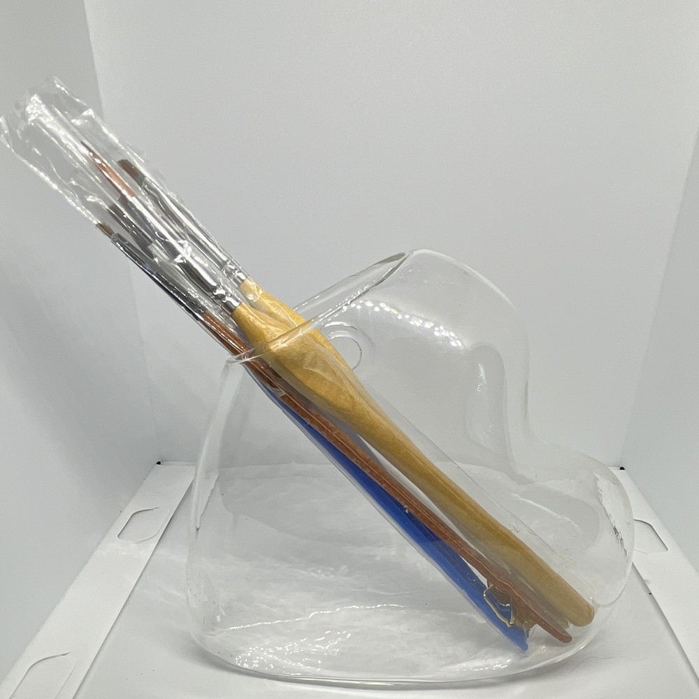 Clear glass heart shaped vase that can be used as a vase, storage, gift or decor