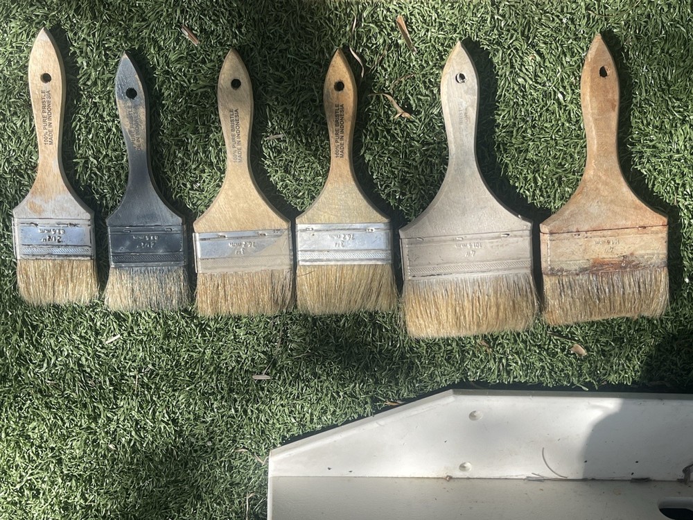 assorted paint brushes /two 4 Inch / Two 3 Inch / Two 2.5 Inch
