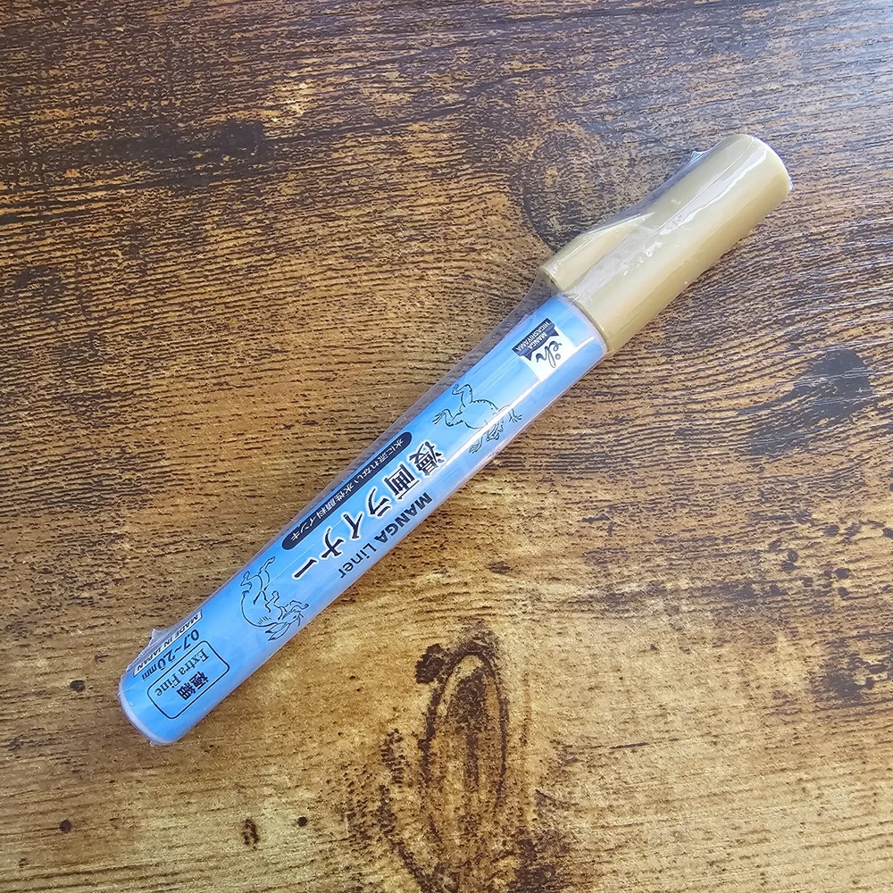Aitoh Manga Liner gold paint pen featuring a fine 2mm fiber tip