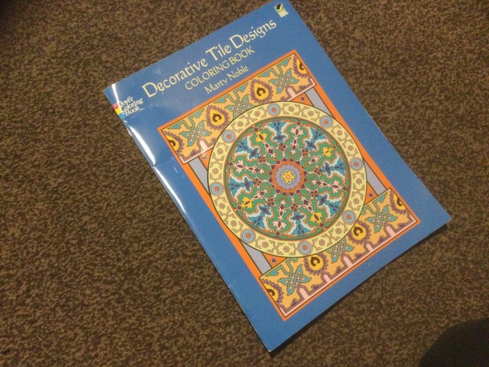 Colouring book for Teens/Adults. First 2 pages partly used by Dover